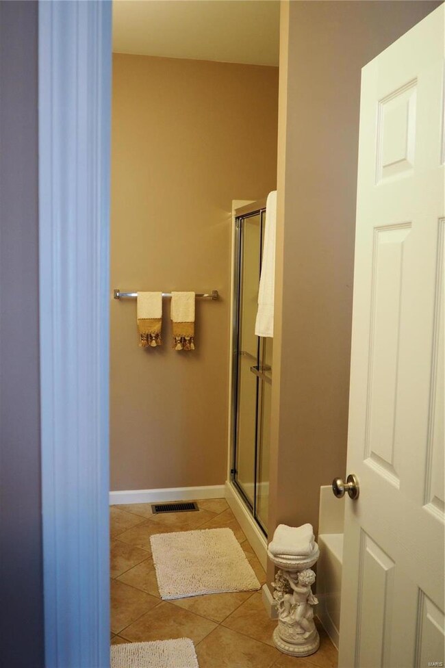 Master bath with separate shower and tub