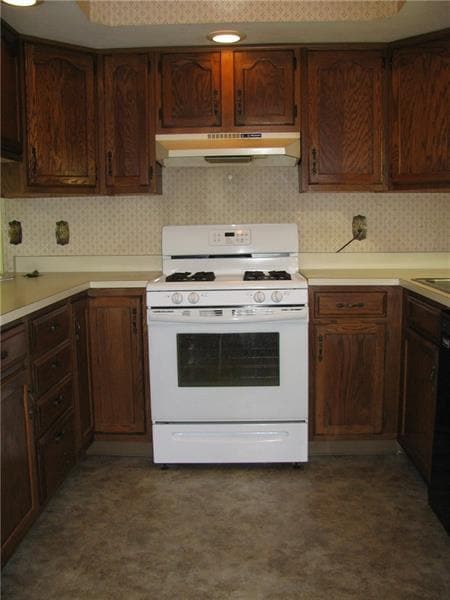 Oak kitchen with appliance package.