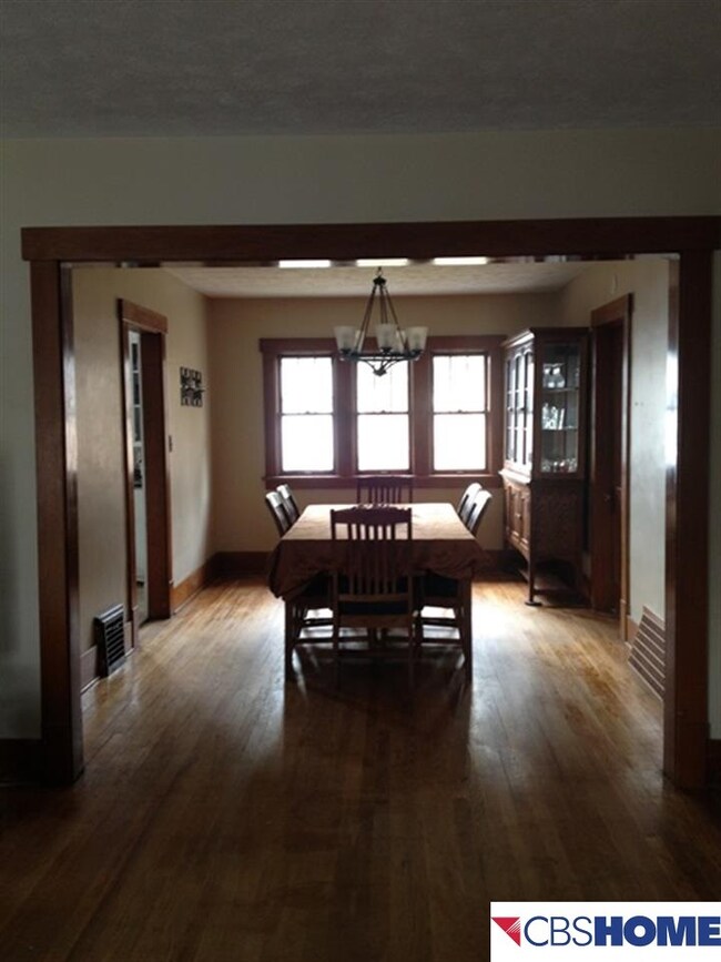 w/lots of natural light and hardwood floors