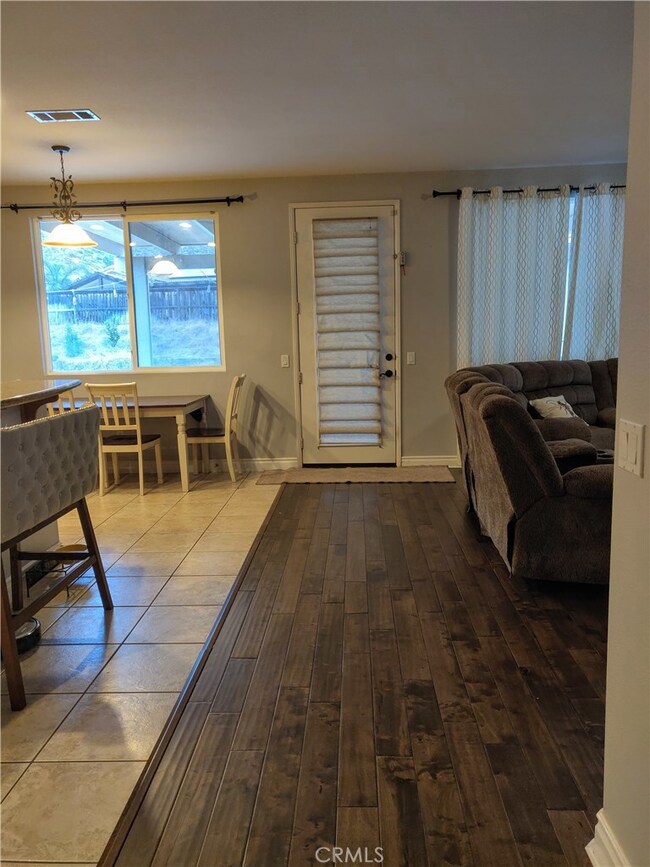 view to kitchen and family room at rear of home.