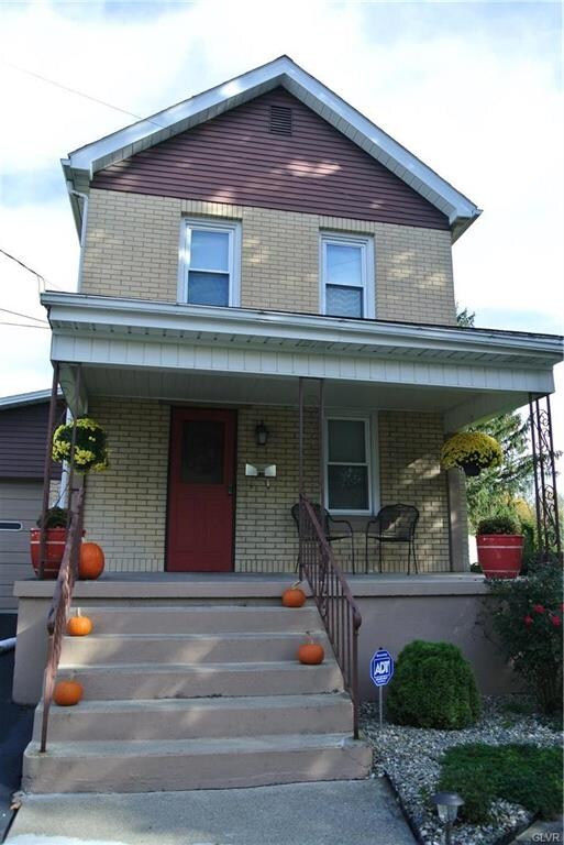Rocking chair front porch.  Note all the updated t