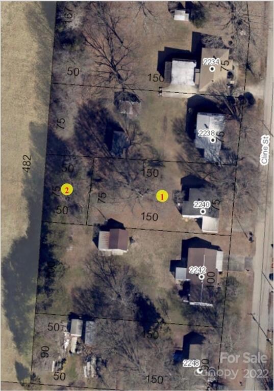 Aerial photo of both parcels labeled in yellow 