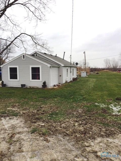Front and Side View of Home and Yard