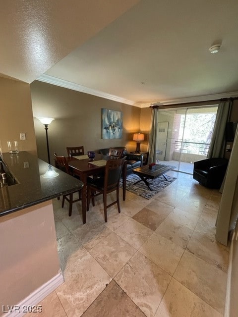 Dining space with ornamental molding