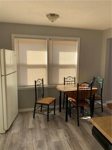Eating area.  Table and Chairs can stay.  New floo