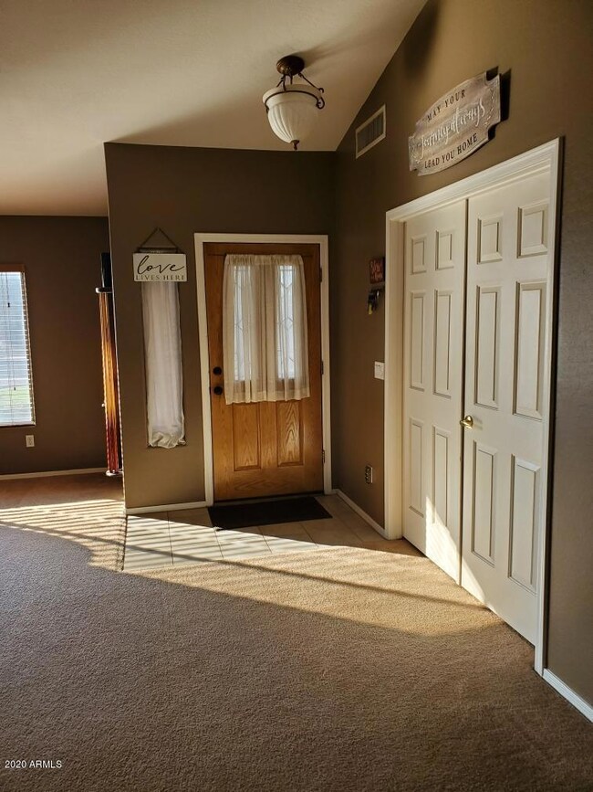 Front door and door to den