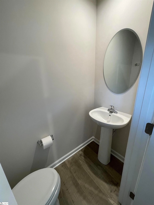 Powder room on left at entrance to home.