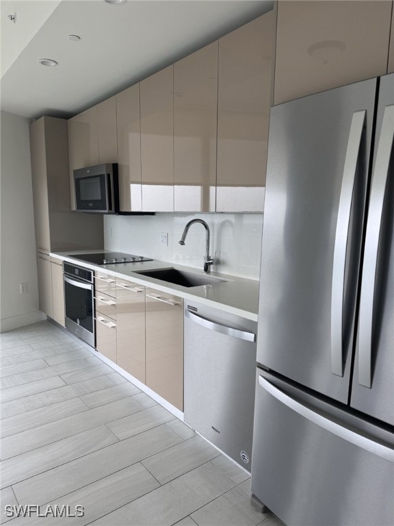 Kitchen featuring appliances with stainless steel