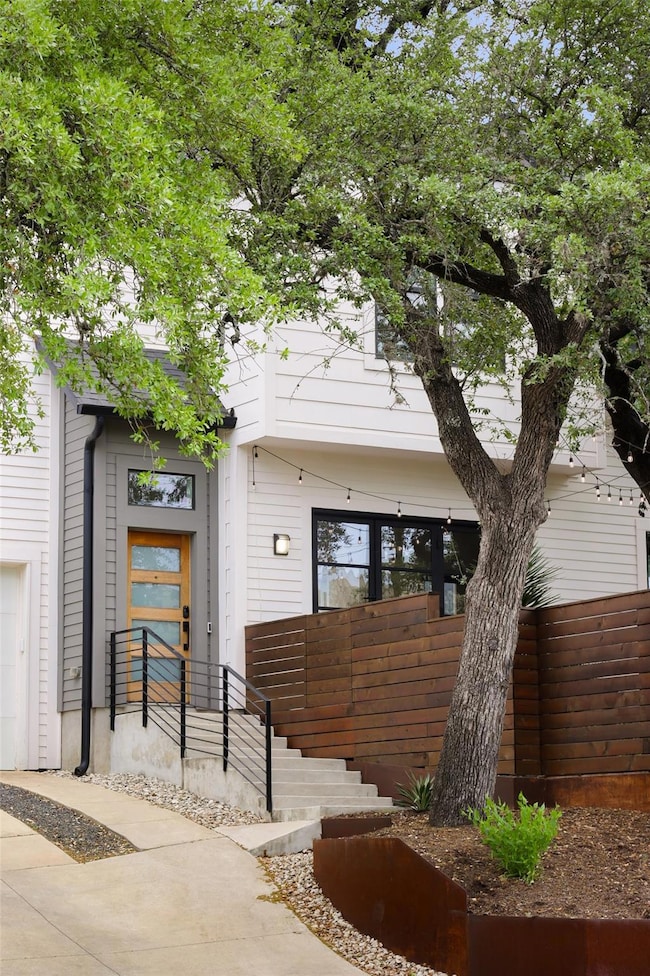 A welcoming foyer sets a chic first impression and opens to the bright main living areas.