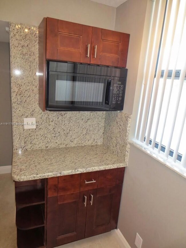 115 Lake Emerald Dr unit 203, Oakland Park, FL 33309 - photo 3