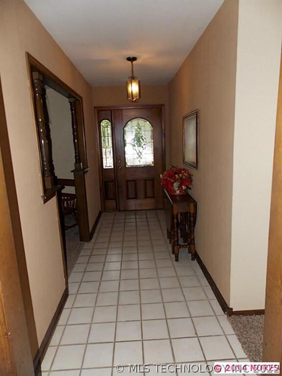 Beautiful front door leads into a nice sized entry