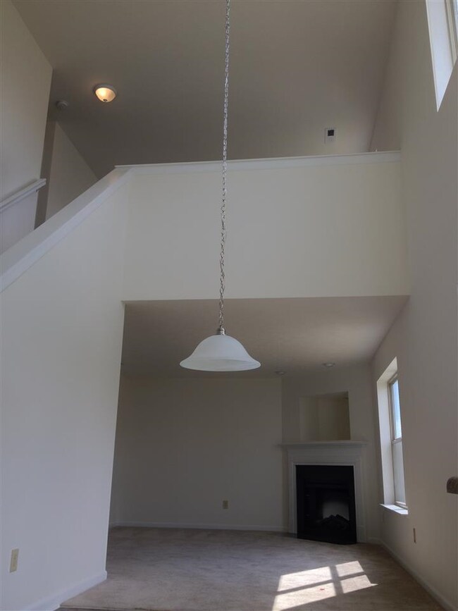 View of Loft and Hearth Room from Kitchen