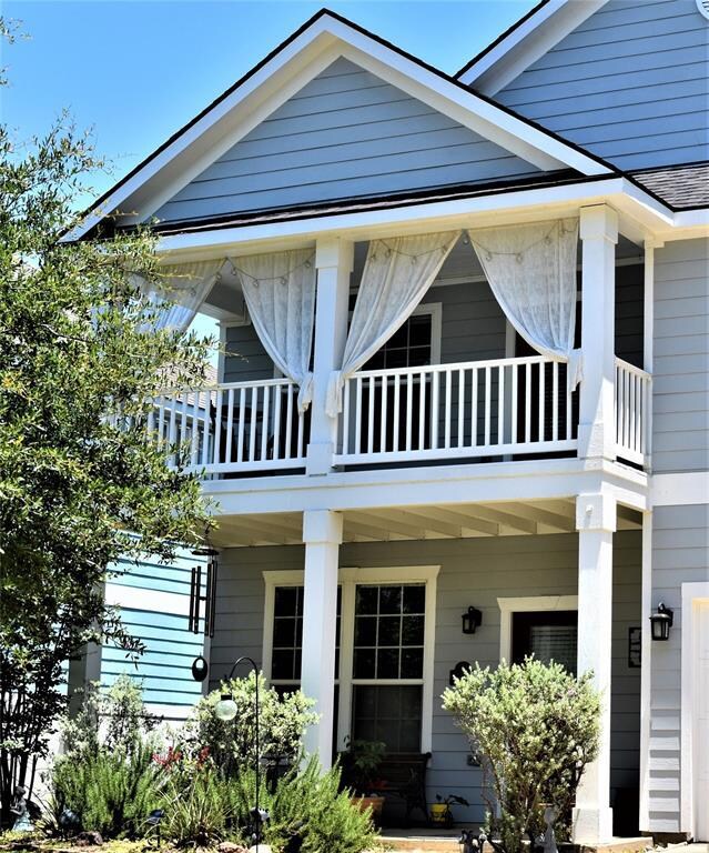 Front Entrance and Balcony Covered Porches