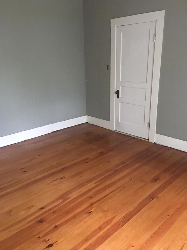 The house has beautiful hardwood floors. 