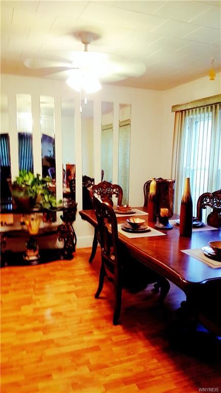 LARGE FORMAL DINING ROOM, PERGO FLOOR,CEILING FAN
