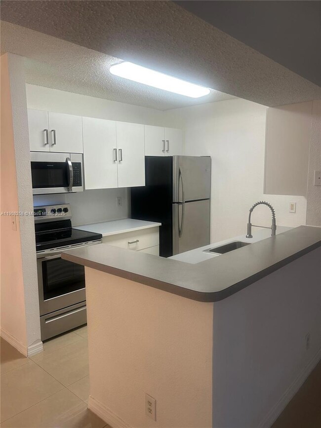 3995 W Mcnab Rd unit B310, Pompano Beach, FL 33069 - photo 5