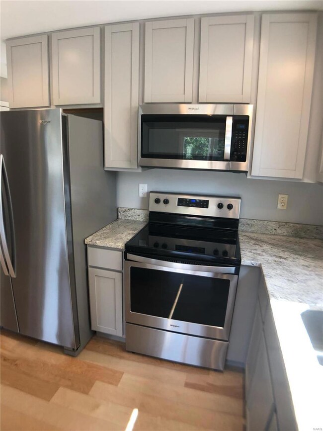 Electric range and microwave hood