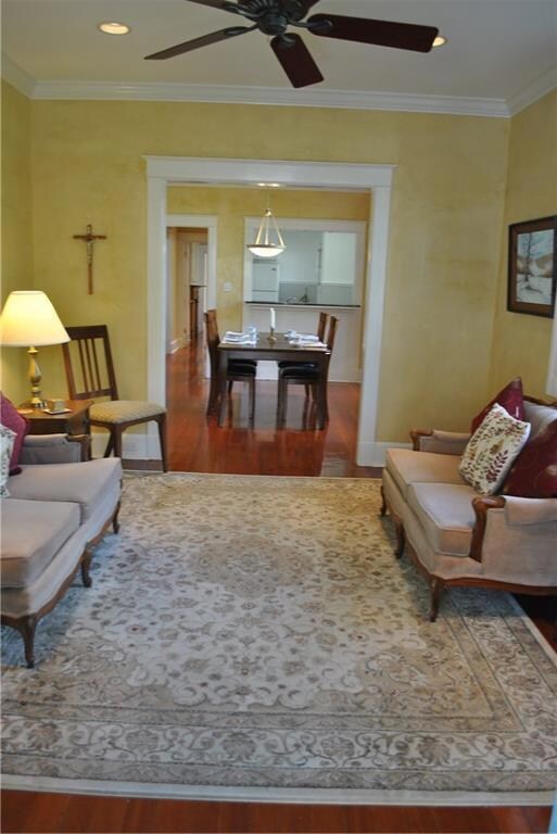 Similar view highlights the gleaming wood floors a