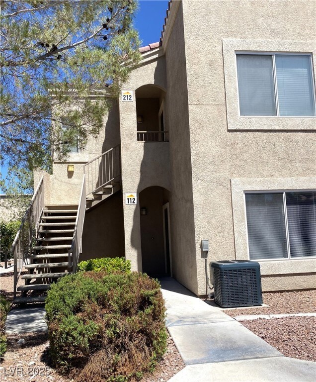 View of building exterior featuring stairs