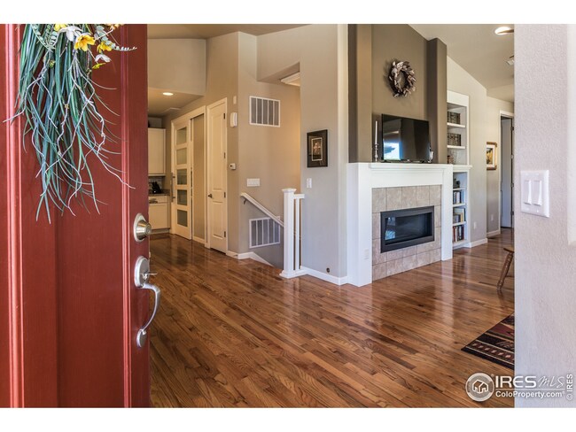 Home has lovely neutral color scheme and rich hard wood floors