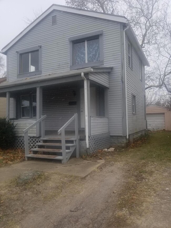 1381 E 20th side view 1 car gar