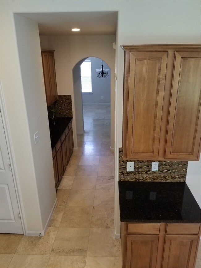 The very convenient Butlers Pantry in-between the kitchen and dining room