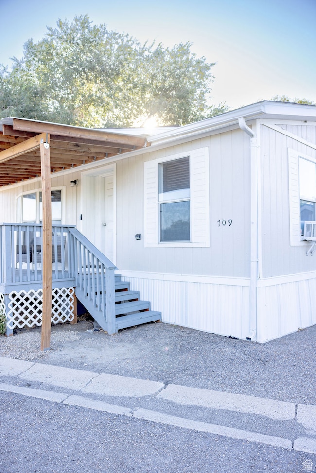 View of front facade featuring a deck