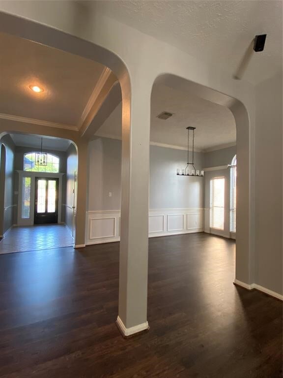 Entryway showing formal dining room
