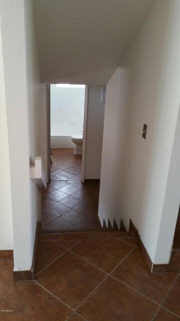 downstairs to lower levl