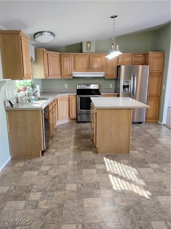 Kitchen featuring dishwashing machine, stove, rang