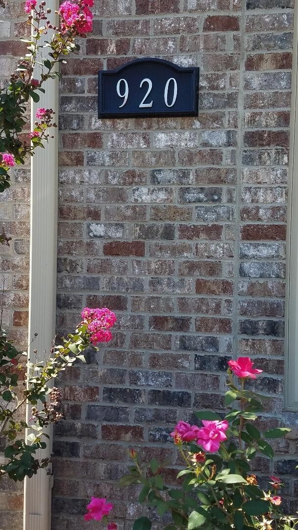 Welcome to 920 Redstone. Rocking chair front porch and covered rear patio, too!