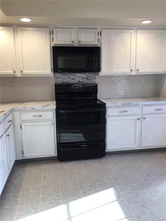 totally remodeled kitchen with new appliances, bac