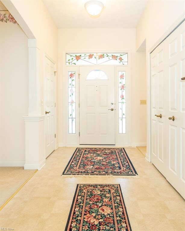 Entry Foyer with double coat closet...