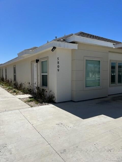 View of home's exterior with stucco siding