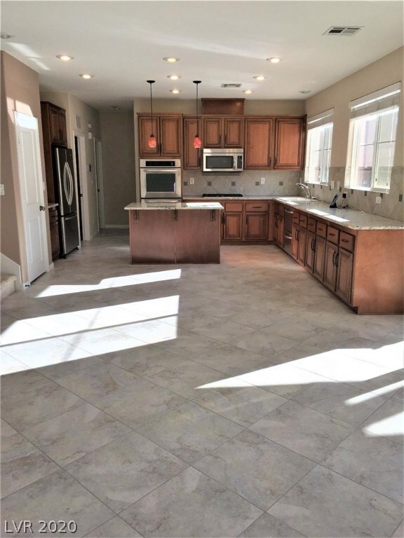 Custom cabinets with stainless steel appliances