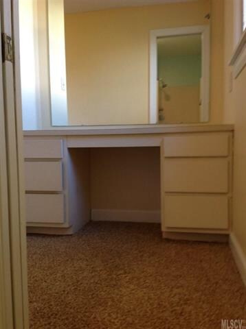 vanity area in master bed