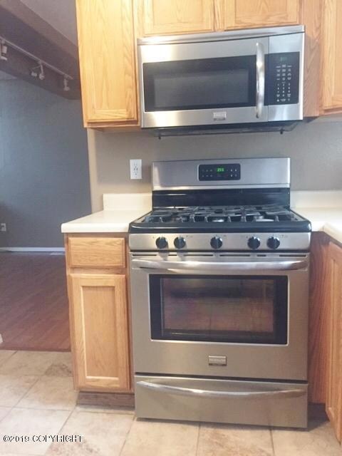 kitchen with ss gas range