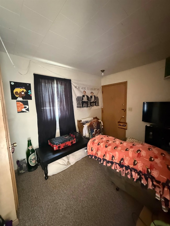 could be front porch, office or sitting room