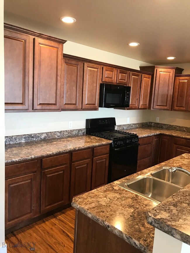 Kitchen. Photo of similar home.