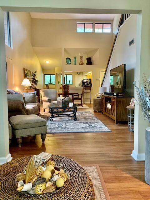 Living area with vaulted ceilings and lots of ligh