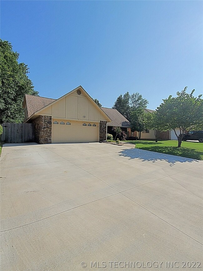 New driveway that is huge for extra parking or for