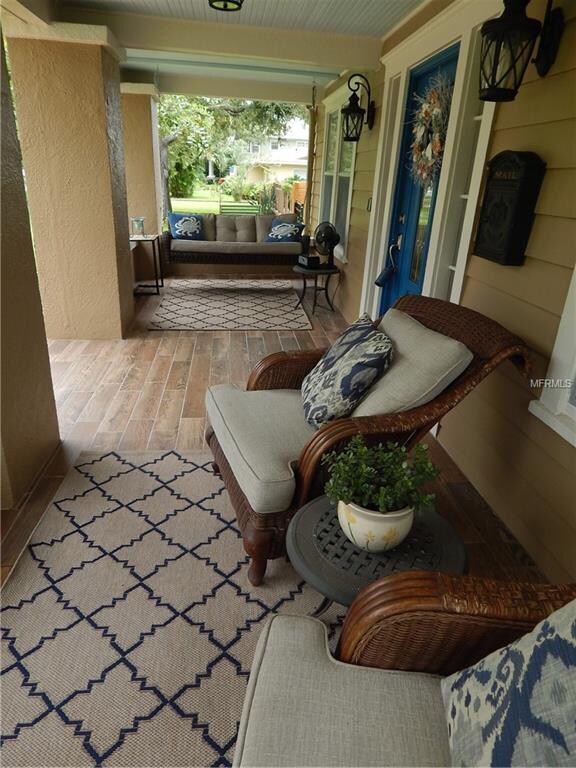 Nice wooden ceramic tile on large porch