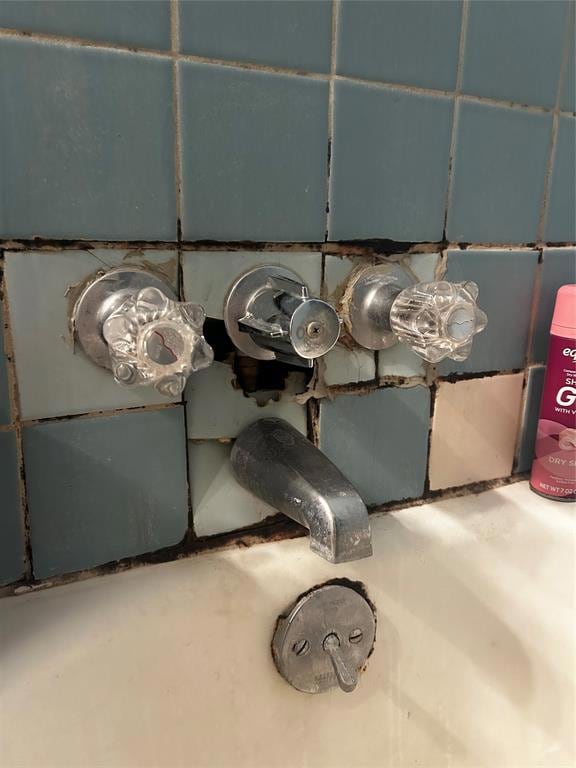 broken tile in shower