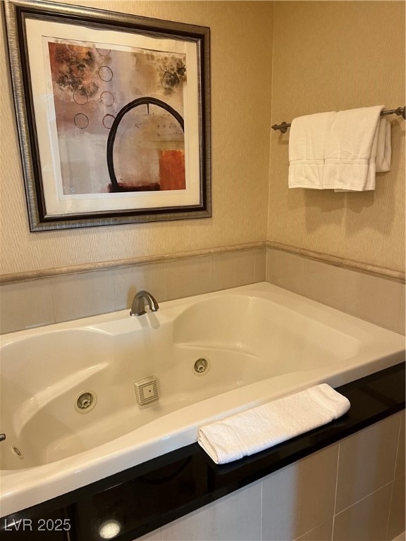 Full bathroom with a jetted tub