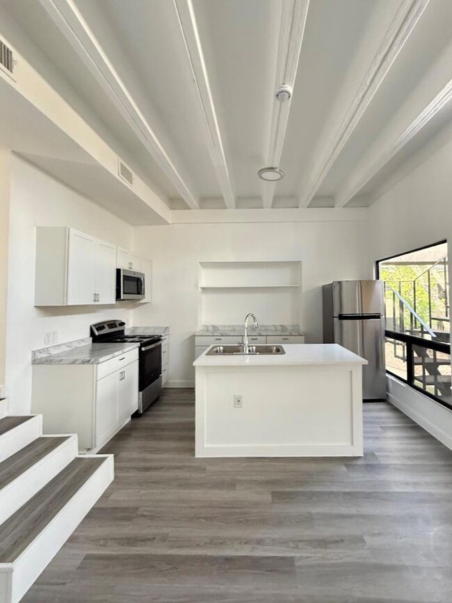 Kitchen featuring appliances with stainless steel