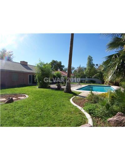 Exterior Back. ~VIEW FROM NORTH SIDE OF BACK YARD~