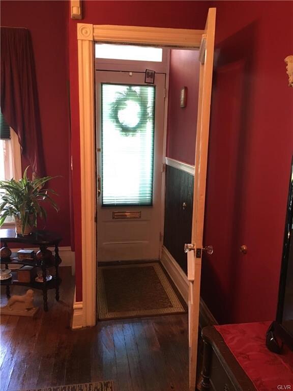 The foyer has Lincrusta wainscotting, chair rail a