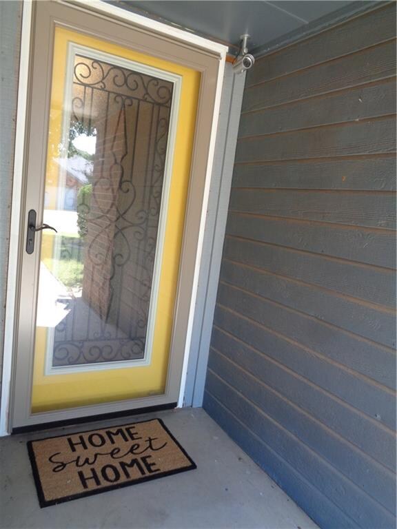 Updated front door with Pella storm door too.
