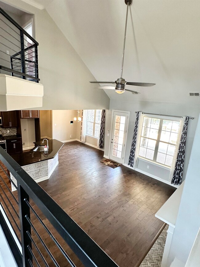 Interior space with dark hardwood / wood-style flo