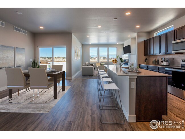 DINING ROOM & KITCHEN OPEN TO LIVING ROOM